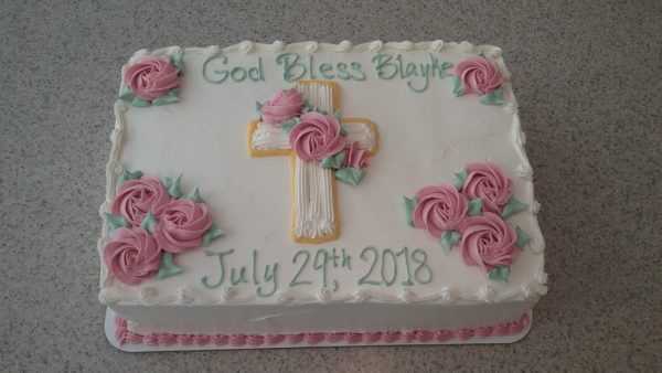 Cross and Pink Rosettes Cake