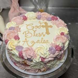 Rosette and Gold Cross Cake